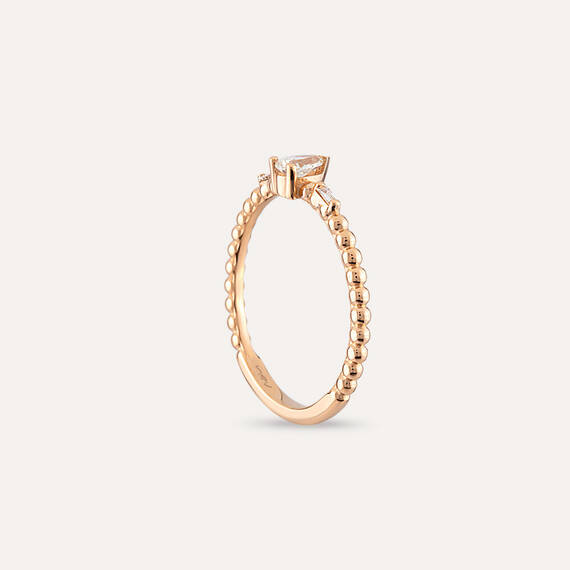 0.22 CT Pear Cut Diamond Rose Gold Ring - 7